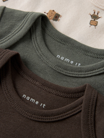 Name it | Kruippak Boys Zip Airplane Peyote/Tradewinds