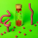 Petit Boum | Sensorisch Speelgoed Fles Spiraal Roze